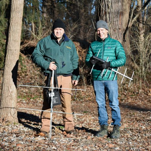 Dr. Eugene Potapov (BAC) and Chris Mendel (PERT) with devices for remote collar release and retrieval.